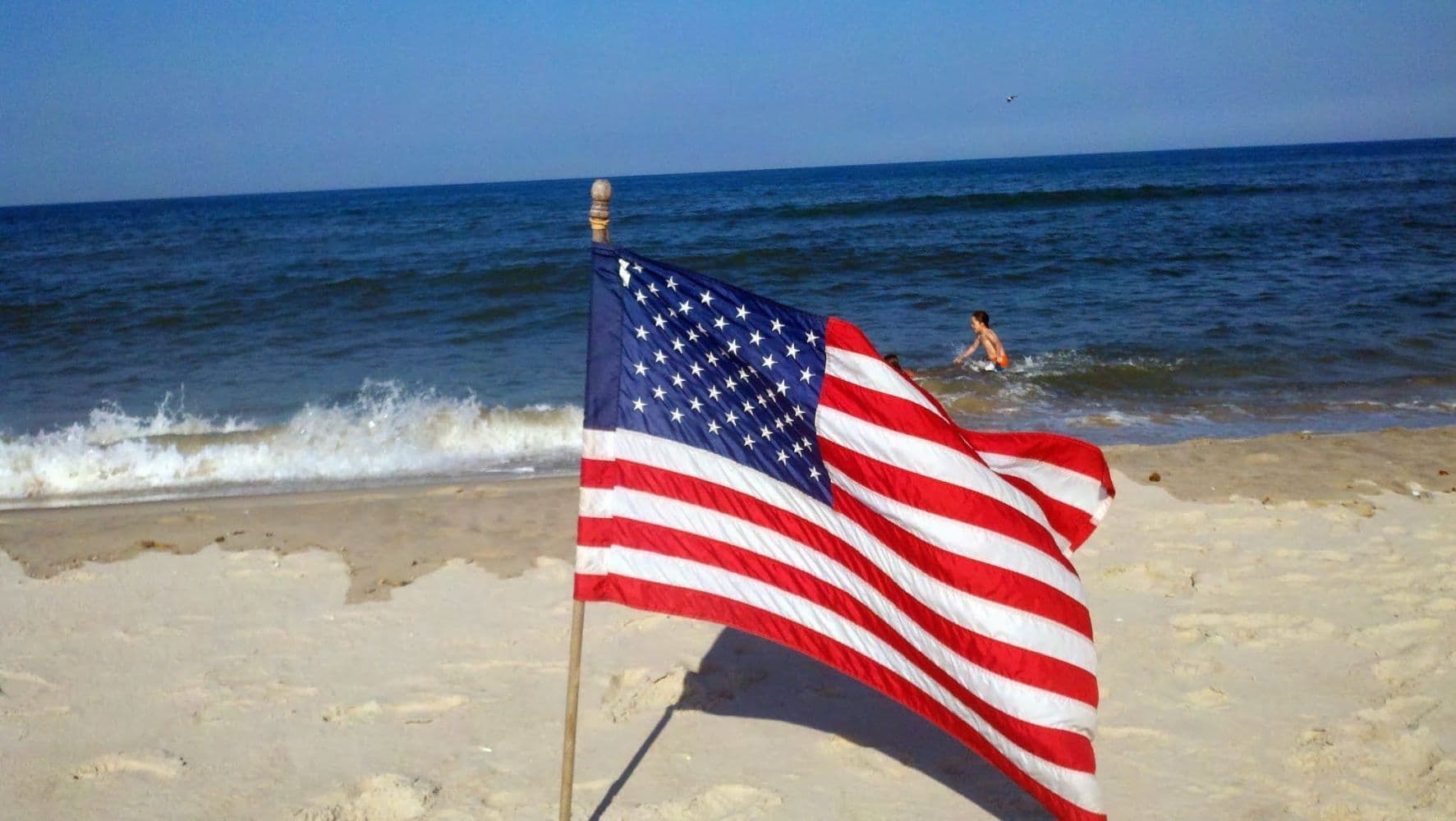 American flag on the beach in Ocean City MD